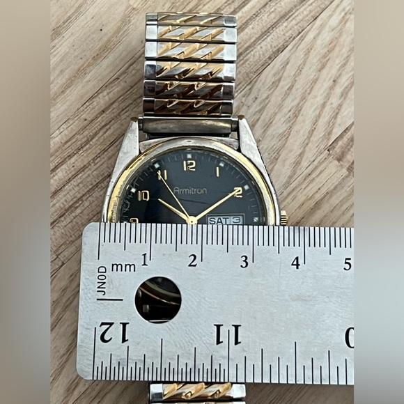 Armitron Men’s Watch Black Dial Day Date Window Two Tone Stretch Bracelet - Picture 11 of 11